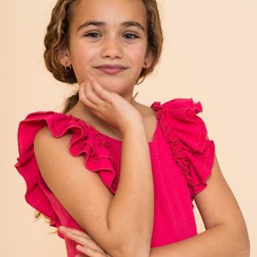 Mono Ceremonia Niña Fucsia. La Ormiga